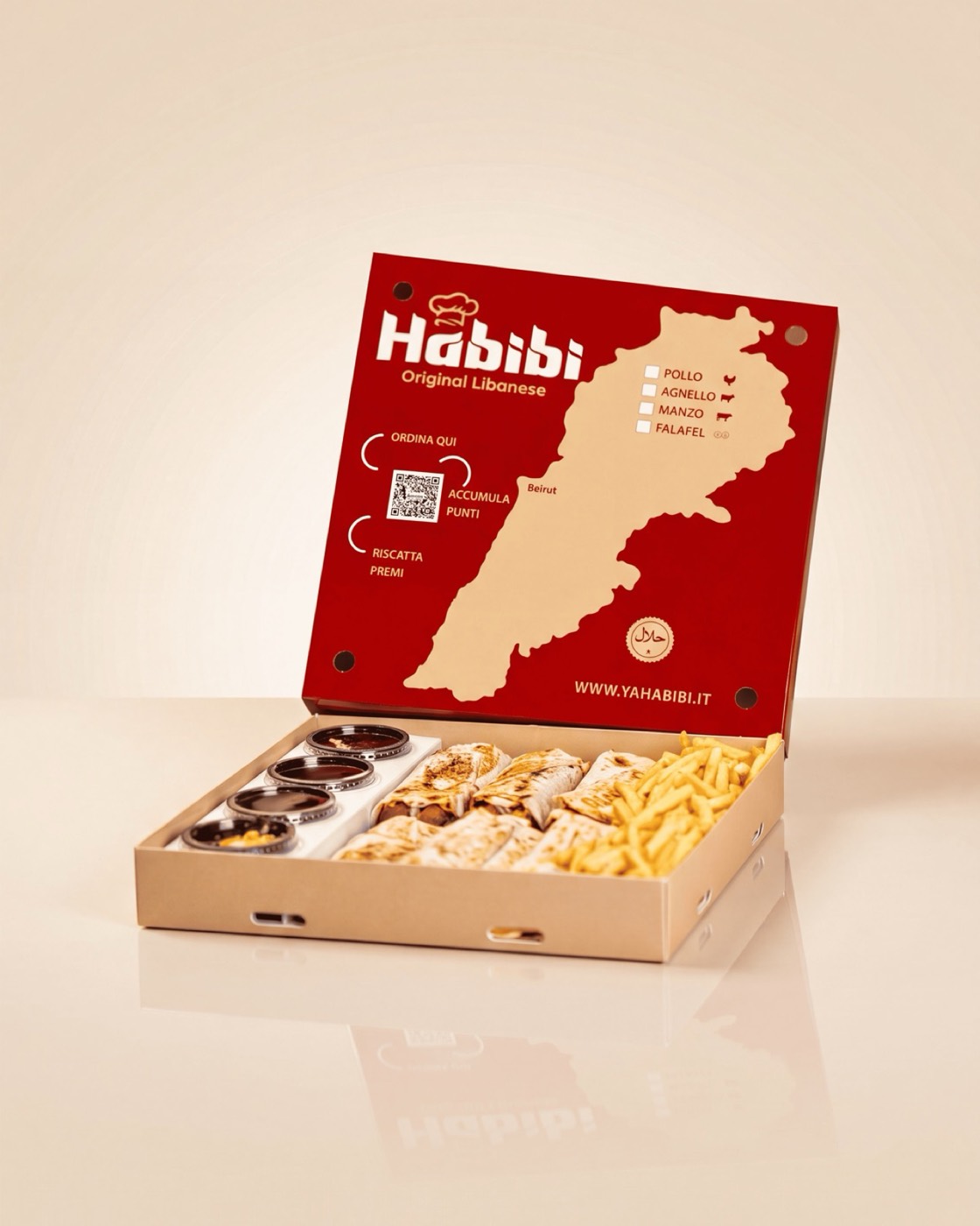 Habibi Box da asporto con panino, patatine e contorni.