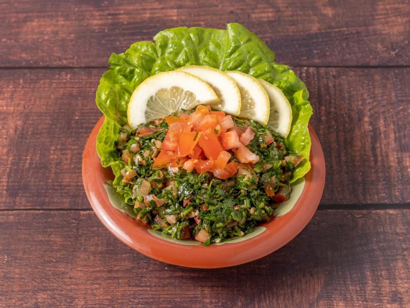 Tabbouleh, insalata di prezzemolo, bulgur, pomodoro e limone.